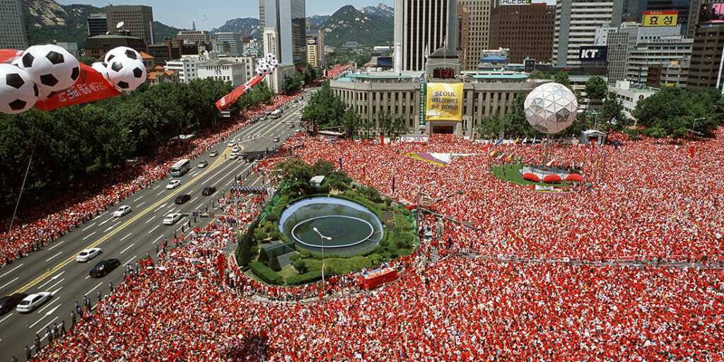 Seoul Plaza 2002 FIFA World Cup massive crowd watching public broadcast of game