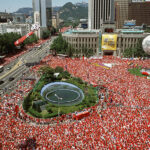 Seoul Plaza 2002 FIFA World Cup massive crowd watching public broadcast of game
